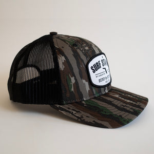 Surf Station Surf & Supply Men's Low-Profile Trucker Hat - Realtree Camo/Black