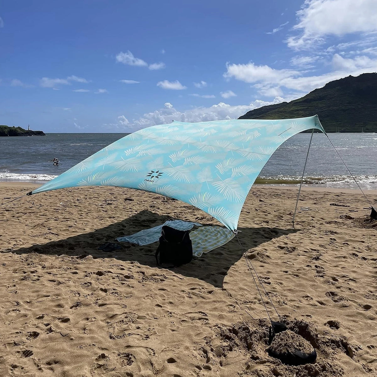 largest beach tent Neso Grande Prints Beach Tent - Aqua Fronds